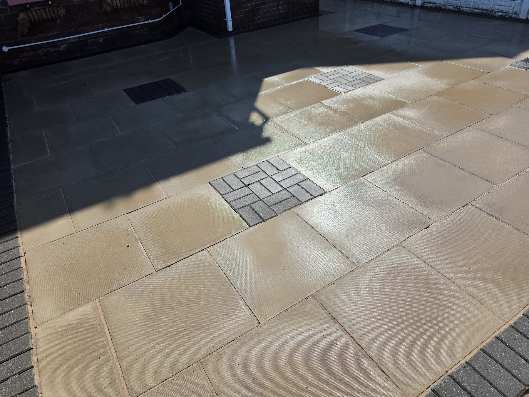 After patio and driveway pressure washing in Southport by Evans Exterior Services